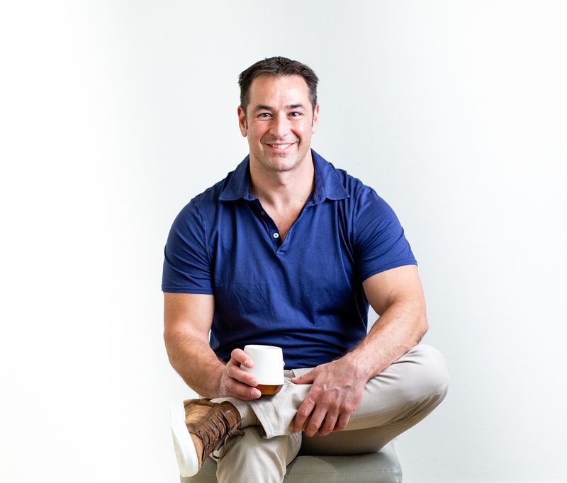 Portrait of Justin Singer, founder of Singer Holdings.